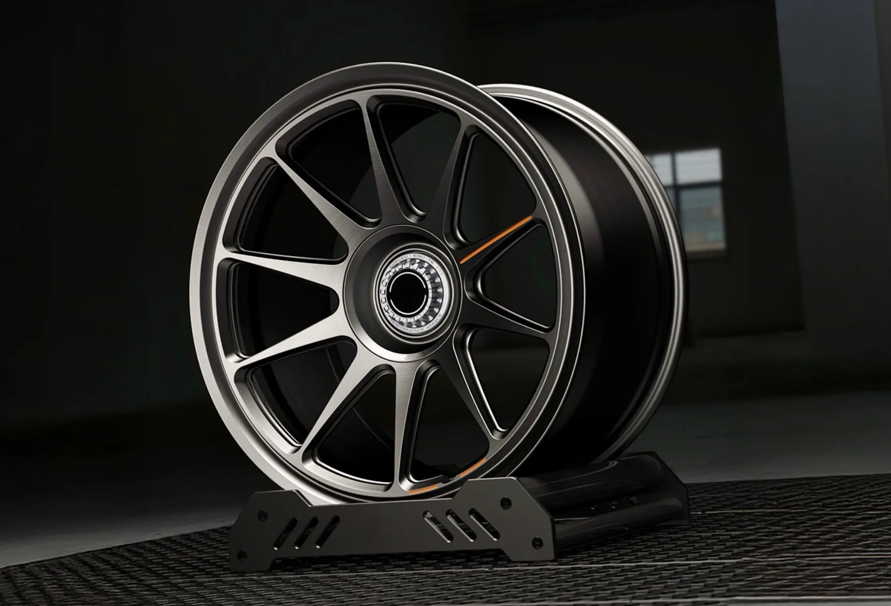 URBANLUGS forged wheel in gunmetal Y-spoke design with orange accent