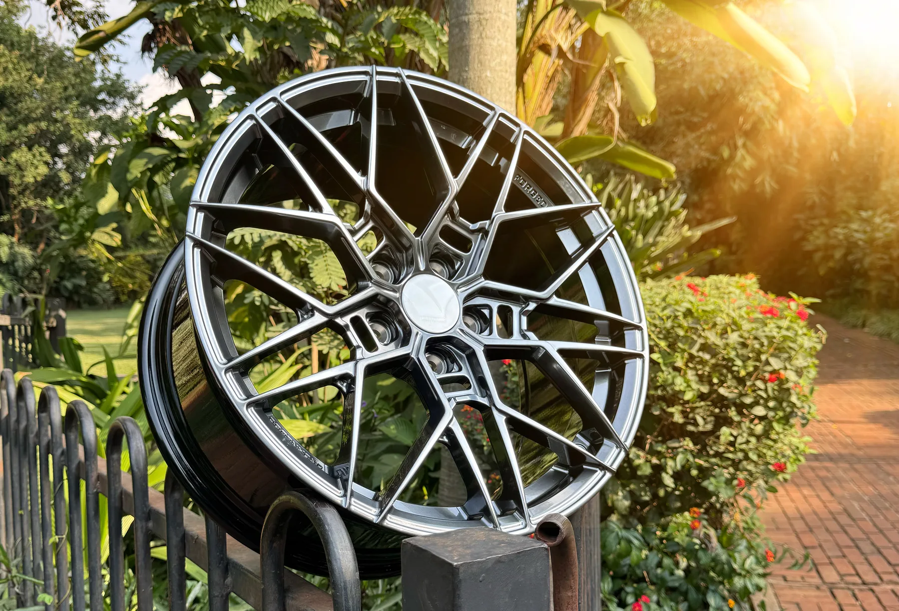URBANLUGS forged wheel in gunmetal mesh design, outdoor shot